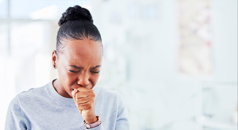 Sick, cough and black woman with sore throat at home for influenza, cold or allergies on wall background